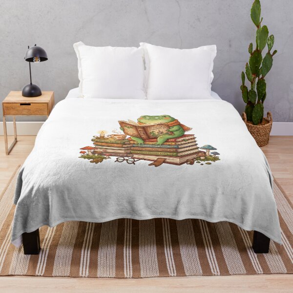 Item preview, Cozy Reading Frog with Books Tea Candle and Mushrooms Illustration designed and sold by AbanoubStore.