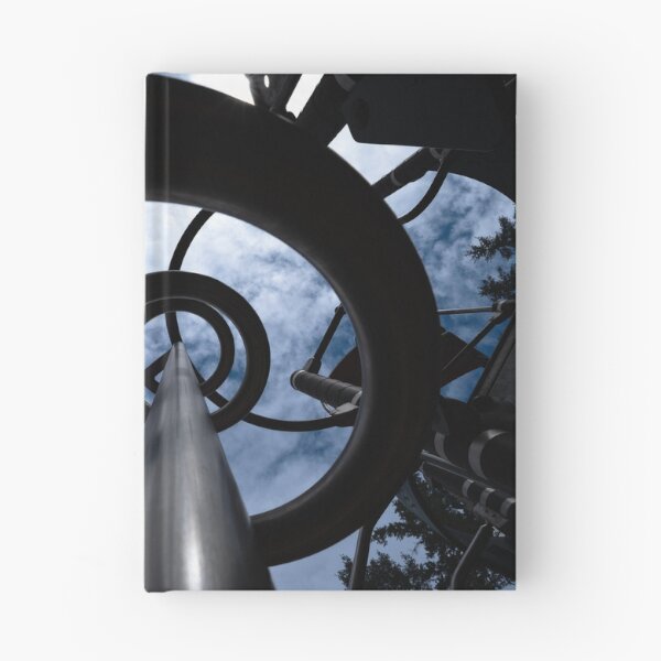 Item preview, Metal spiral structure in playground against dramatic sky designed and sold by lisavonbiela.