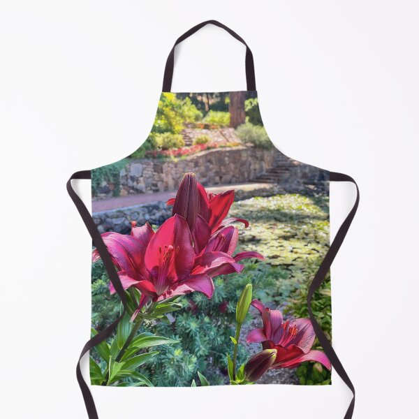 Item preview, Deep Red Lily Flowers Beside Tranquil Garden Pond designed and sold by Be Captured by Brittany Emma.