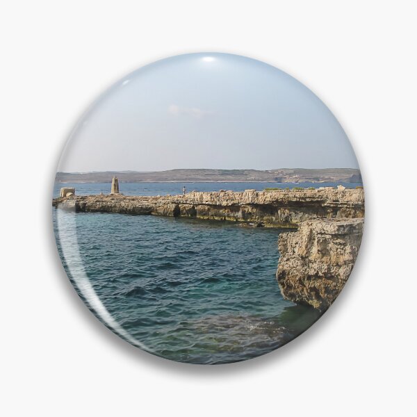 Item preview, Rocky Coastal Cliffs Over Clear Turquoise Sea With Submerged Rocks and Sunny Sky designed and sold by Nmallia.