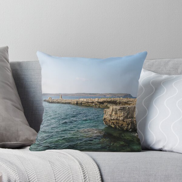 Item preview, Rocky Coastal Cliffs Over Clear Turquoise Sea With Submerged Rocks and Sunny Sky designed and sold by Nmallia.