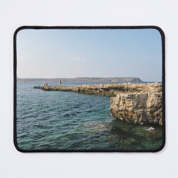 Item preview, Rocky Coastal Cliffs Over Clear Turquoise Sea With Submerged Rocks and Sunny Sky designed and sold by Nmallia.