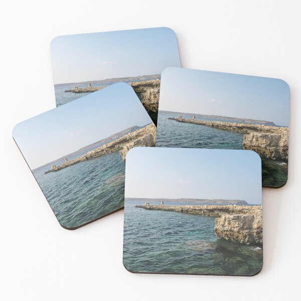 Item preview, Rocky Coastal Cliffs Over Clear Turquoise Sea With Submerged Rocks and Sunny Sky designed and sold by Nmallia.