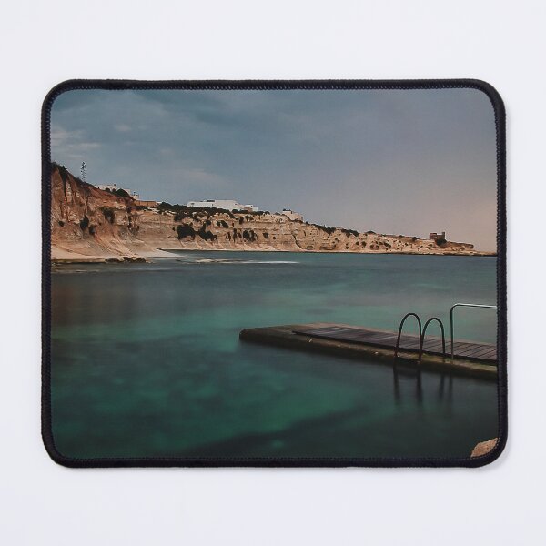 Item preview, Moody Rocky Shoreline and Coastal Harbor Waterfront Along Calm Sea Under Overcast Sky designed and sold by Nmallia.