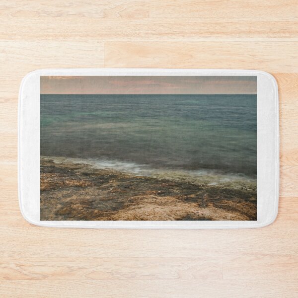 Item preview, Moody Rocky Shoreline and Coastal Harbor Waterfront Along Calm Sea Under Overcast Sky designed and sold by Nmallia.