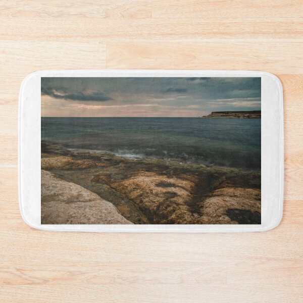 Item preview, Moody Rocky Shoreline and Coastal Harbor Waterfront Along Calm Sea Under Overcast Sky designed and sold by Nmallia.