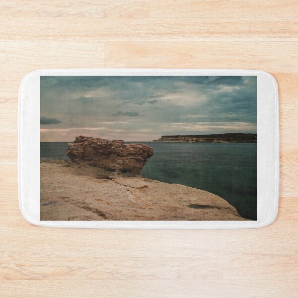 Item preview, Moody Rocky Shoreline and Coastal Harbor Waterfront Along Calm Sea Under Overcast Sky designed and sold by Nmallia.