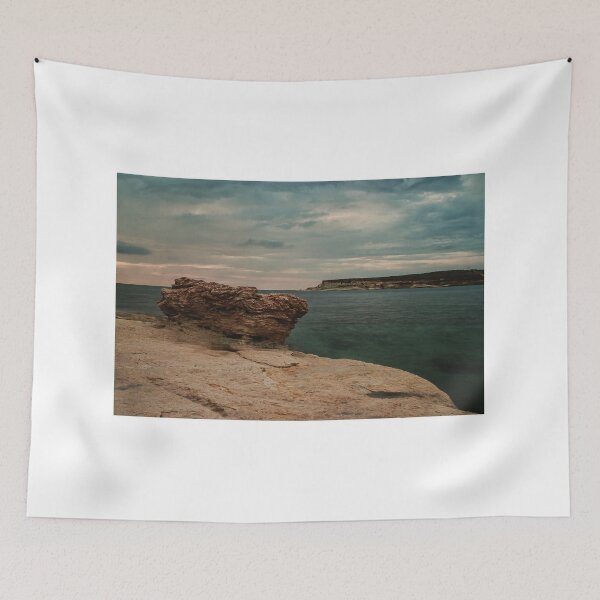 Item preview, Moody Rocky Shoreline and Coastal Harbor Waterfront Along Calm Sea Under Overcast Sky designed and sold by Nmallia.