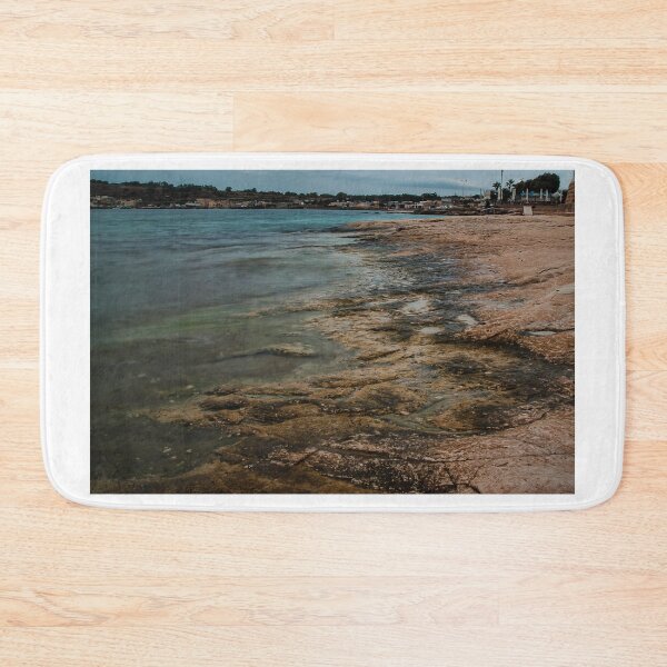 Item preview, Moody Rocky Shoreline and Coastal Harbor Waterfront Along Calm Sea Under Overcast Sky designed and sold by Nmallia.