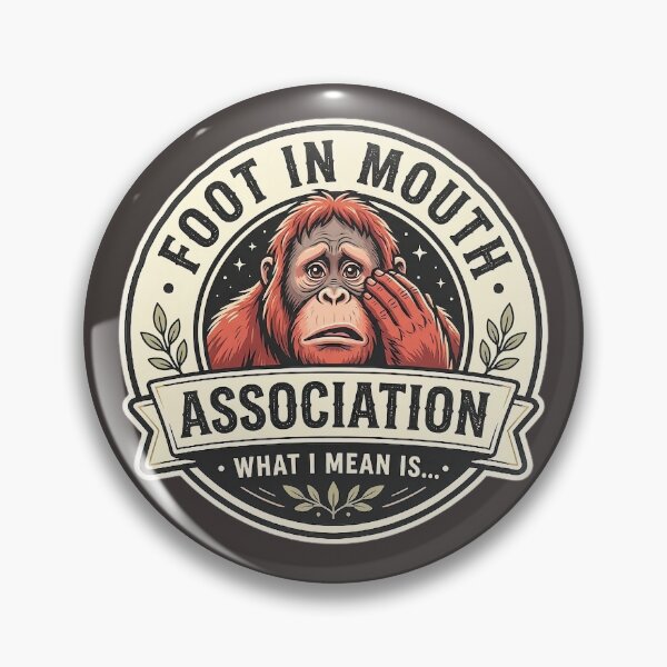 Item preview, Foot In Mouth Association T-Shirt - What I Mean Is... Orangutan Vintage Badge Logo Design  designed and sold by Halejo68.