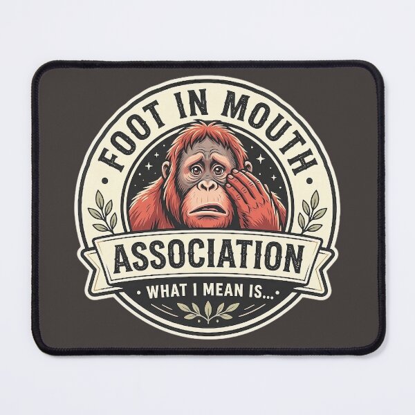 Item preview, Foot In Mouth Association T-Shirt - What I Mean Is... Orangutan Vintage Badge Logo Design designed and sold by Halejo68.