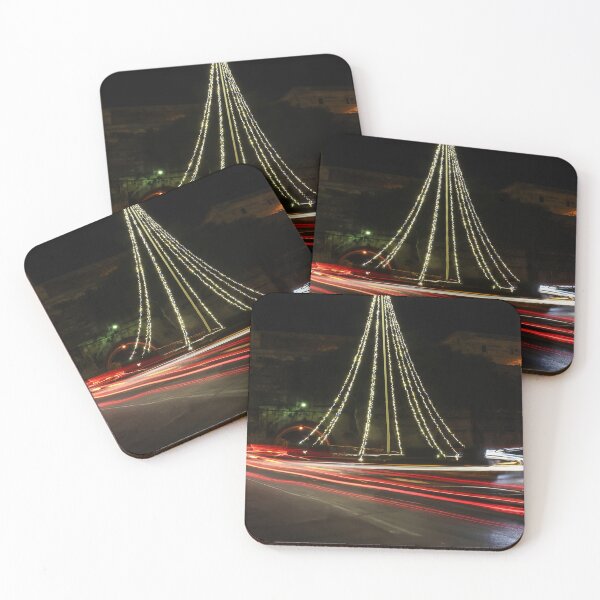 Item preview, Christmas Lights Tree on Roundabout With Long Exposure Traffic Light Trails at Night designed and sold by Nmallia.
