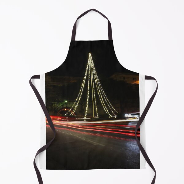 Item preview, Christmas Lights Tree on Roundabout With Long Exposure Traffic Light Trails at Night designed and sold by Nmallia.