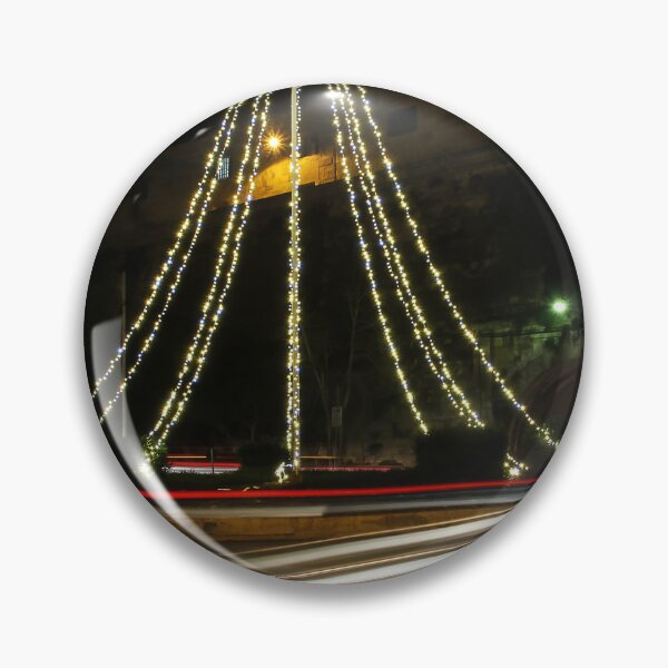Item preview, Christmas Lights Tree on Roundabout With Long Exposure Traffic Light Trails at Night designed and sold by Nmallia.