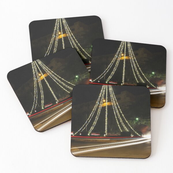 Item preview, Christmas Lights Tree on Roundabout With Long Exposure Traffic Light Trails at Night designed and sold by Nmallia.