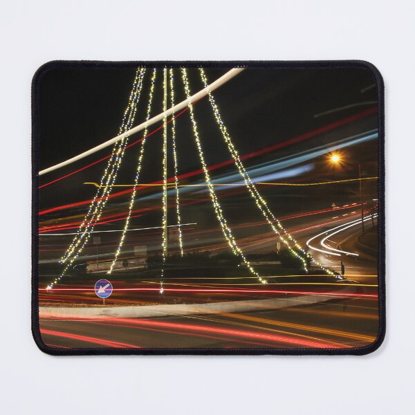 Item preview, Christmas Lights Tree on Roundabout With Long Exposure Traffic Light Trails at Night designed and sold by Nmallia.