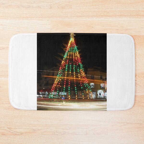 Item preview, Festive Christmas Tree With Colorful Lights and Star Topper Illuminating Nighttime Street designed and sold by Nmallia.