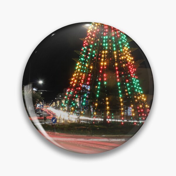 Item preview, Festive Christmas Tree With Colorful Lights and Star Topper Illuminating Nighttime Street designed and sold by Nmallia.