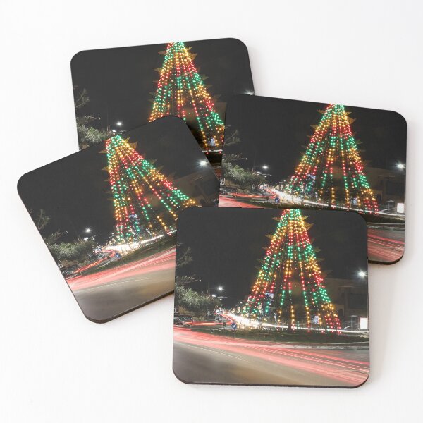 Item preview, Festive Christmas Tree With Colorful Lights and Star Topper Illuminating Nighttime Street designed and sold by Nmallia.