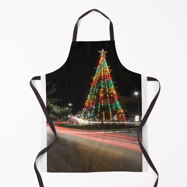 Item preview, Festive Christmas Tree With Colorful Lights and Star Topper Illuminating Nighttime Street designed and sold by Nmallia.