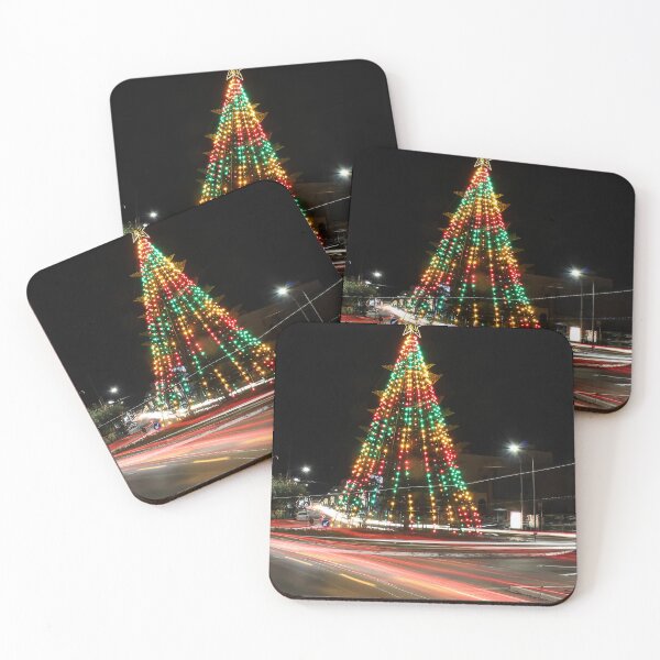 Item preview, Festive Christmas Tree With Colorful Lights and Star Topper Illuminating Nighttime Street designed and sold by Nmallia.