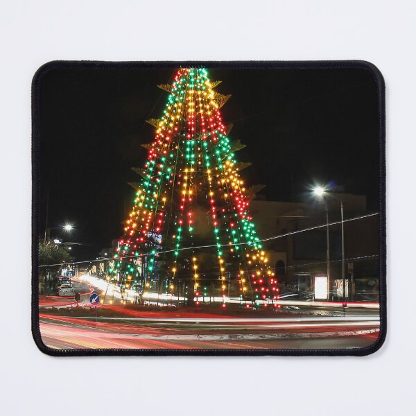 Item preview, Festive Christmas Tree With Colorful Lights and Star Topper Illuminating Nighttime Street designed and sold by Nmallia.