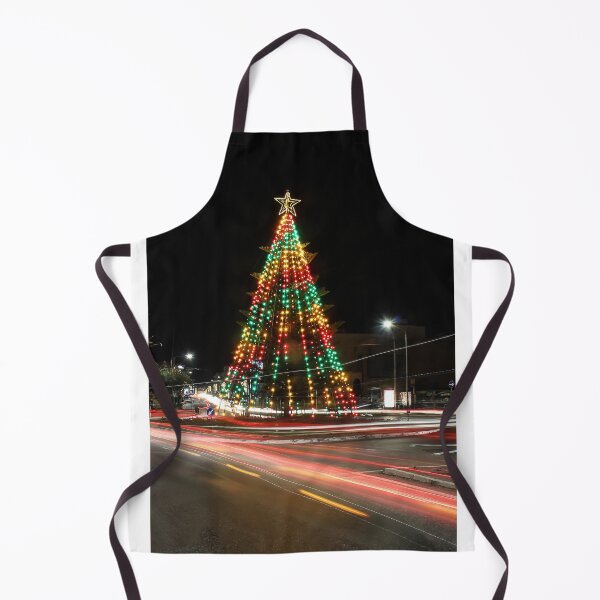 Item preview, Festive Christmas Tree With Colorful Lights and Star Topper Illuminating Nighttime Street designed and sold by Nmallia.