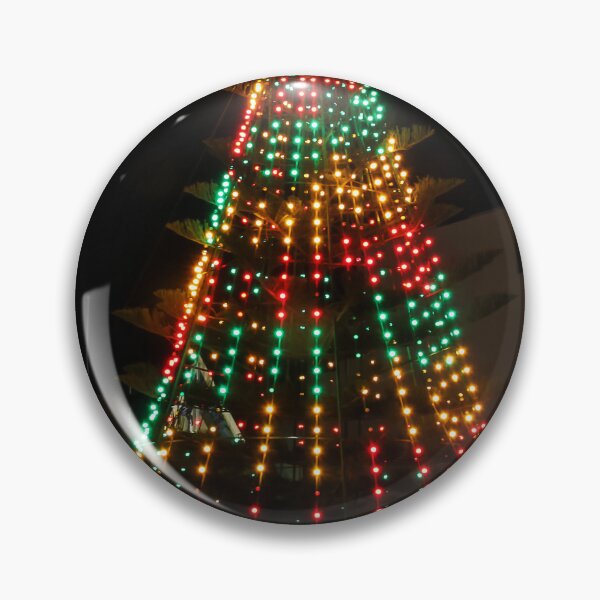 Item preview, Festive Christmas Tree With Colorful Lights and Star Topper Illuminating Nighttime Street designed and sold by Nmallia.