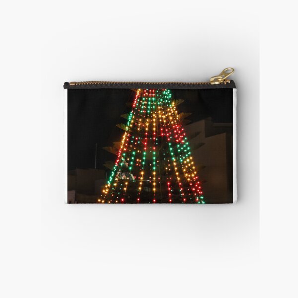 Item preview, Festive Christmas Tree With Colorful Lights and Star Topper Illuminating Nighttime Street designed and sold by Nmallia.