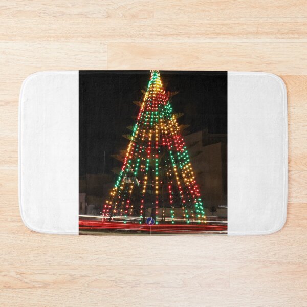 Item preview, Festive Christmas Tree With Colorful Lights and Star Topper Illuminating Nighttime Street designed and sold by Nmallia.