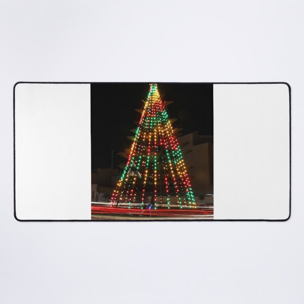 Item preview, Festive Christmas Tree With Colorful Lights and Star Topper Illuminating Nighttime Street designed and sold by Nmallia.