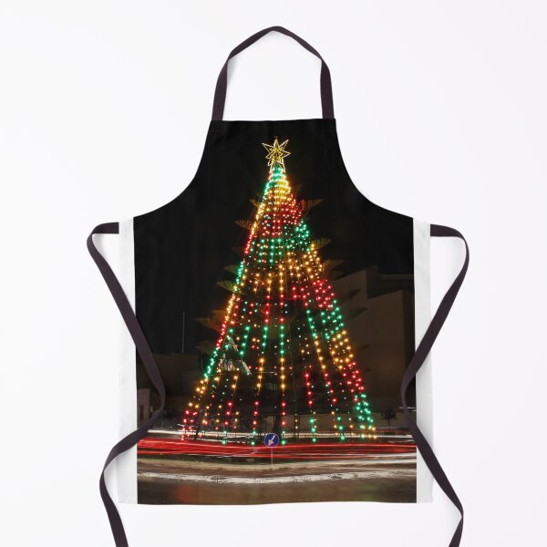 Item preview, Festive Christmas Tree With Colorful Lights and Star Topper Illuminating Nighttime Street designed and sold by Nmallia.