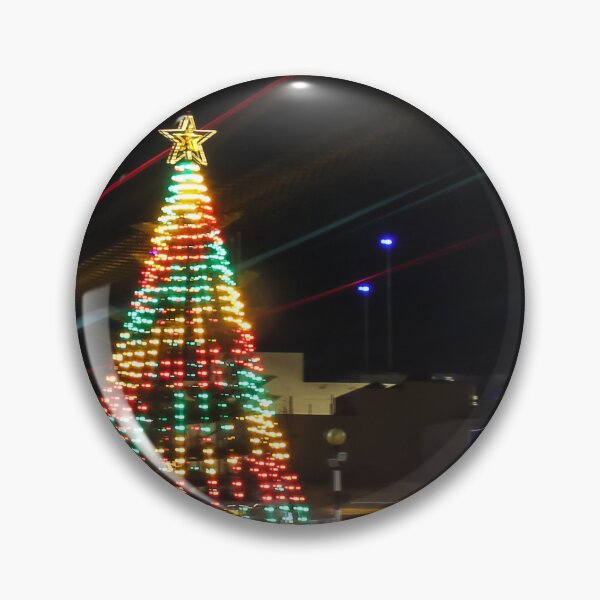 Item preview, Festive Christmas Tree With Colorful Lights and Star Topper Illuminating Nighttime Street designed and sold by Nmallia.