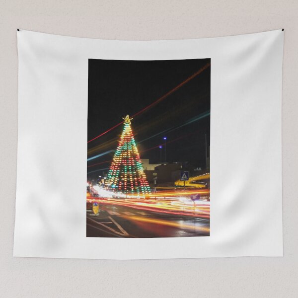 Item preview, Festive Christmas Tree With Colorful Lights and Star Topper Illuminating Nighttime Street designed and sold by Nmallia.