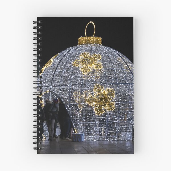 Item preview, Family Enjoying Giant Illuminated Christmas Ornament Decoration With Holiday Lights At Night designed and sold by Nmallia.