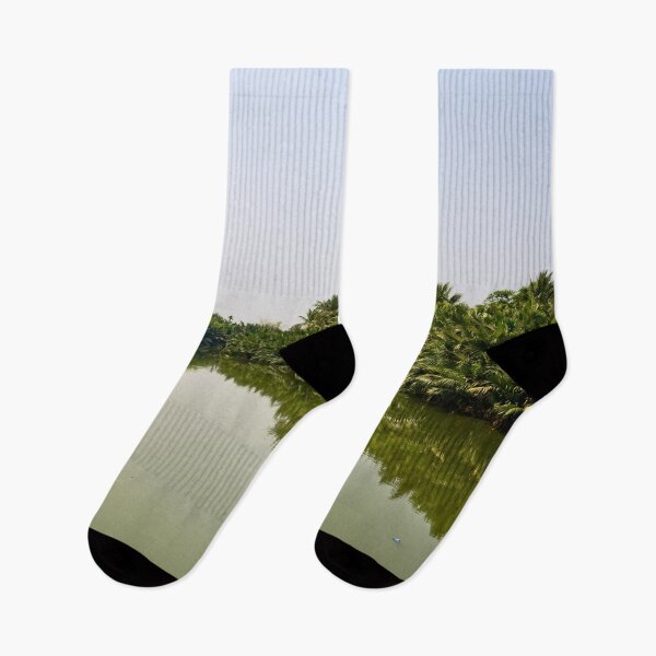 Item preview, Tropical river lined with lush palm trees designed and sold by franck380.