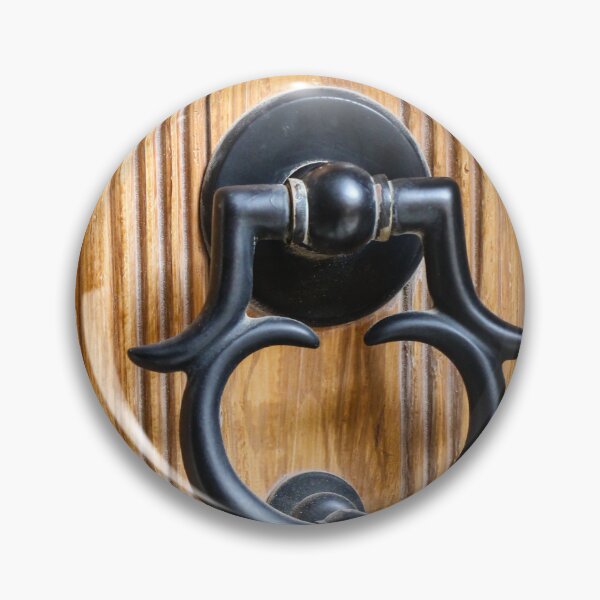 Item preview, Vintage Black Metal Door Knocker On Carved Wooden Front Door Panel Close-Up Entrance designed and sold by Nmallia.