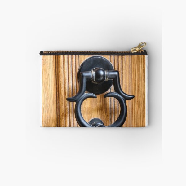 Item preview, Vintage Black Metal Door Knocker On Carved Wooden Front Door Panel Close-Up Entrance designed and sold by Nmallia.