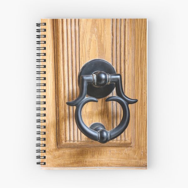 Item preview, Vintage Black Metal Door Knocker On Carved Wooden Front Door Panel Close-Up Entrance designed and sold by Nmallia.