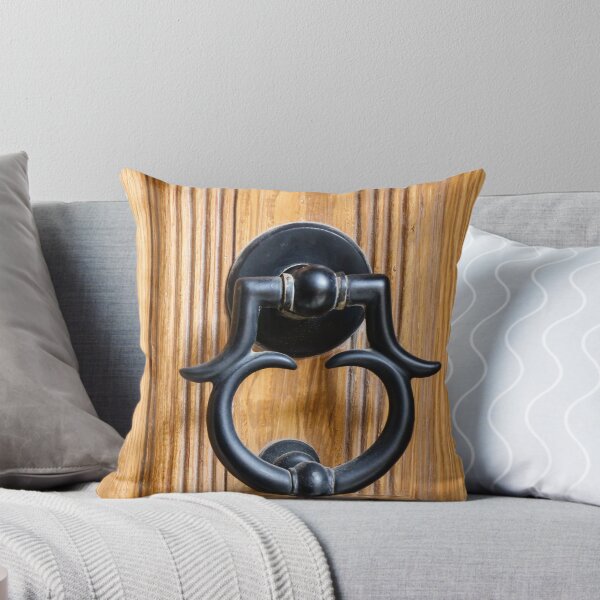 Item preview, Vintage Black Metal Door Knocker On Carved Wooden Front Door Panel Close-Up Entrance designed and sold by Nmallia.