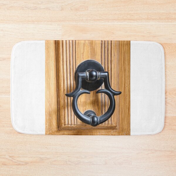 Item preview, Vintage Black Metal Door Knocker On Carved Wooden Front Door Panel Close-Up Entrance designed and sold by Nmallia.