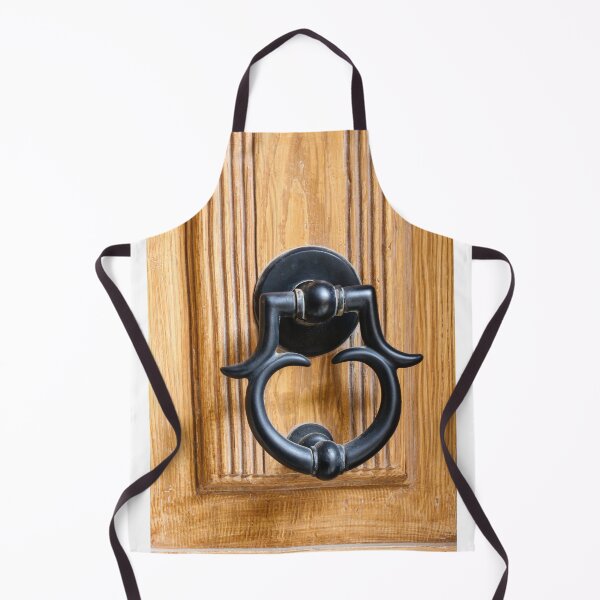 Item preview, Vintage Black Metal Door Knocker On Carved Wooden Front Door Panel Close-Up Entrance designed and sold by Nmallia.