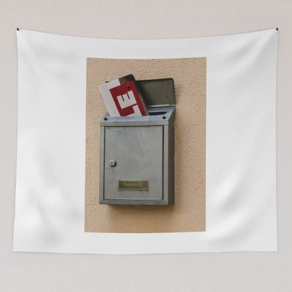 Item preview, Metal Mailbox With Inserted Mail And Red Advertising Flyer On Peach Stucco Wall designed and sold by Nmallia.