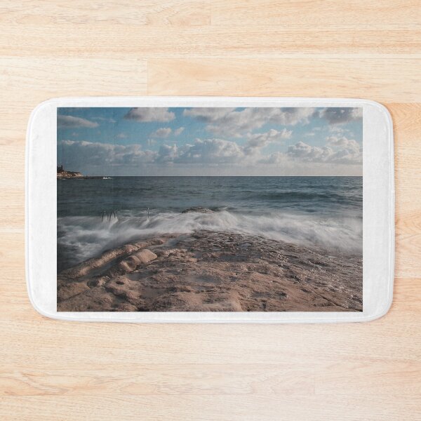 Item preview, Rocky Shore Seascape With Waves Crashing Over Tide Pool and Ocean Horizon Under Clouds designed and sold by Nmallia.