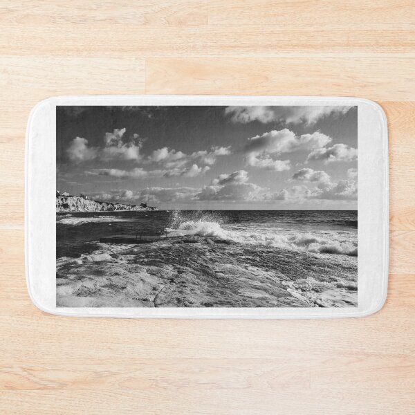 Item preview, Dramatic Black And White Coastal Landscape With Waves Crashing On Rocky Shore Under Cloudy Sky designed and sold by Nmallia.