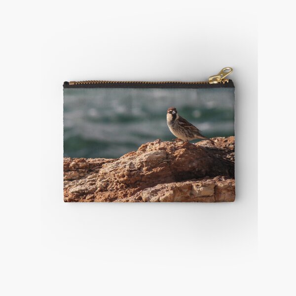 Item preview, Sparrow Perched On Rocky Coastal Cliff Overlooking Sea In Warm Golden Light designed and sold by Nmallia.