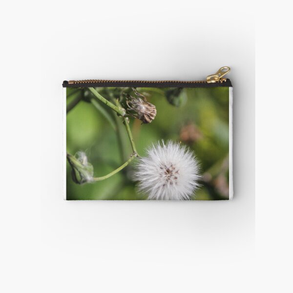 Item preview, Macro Dandelion Seed Head Puff On Green Stem With Soft Bokeh Background designed and sold by Nmallia.