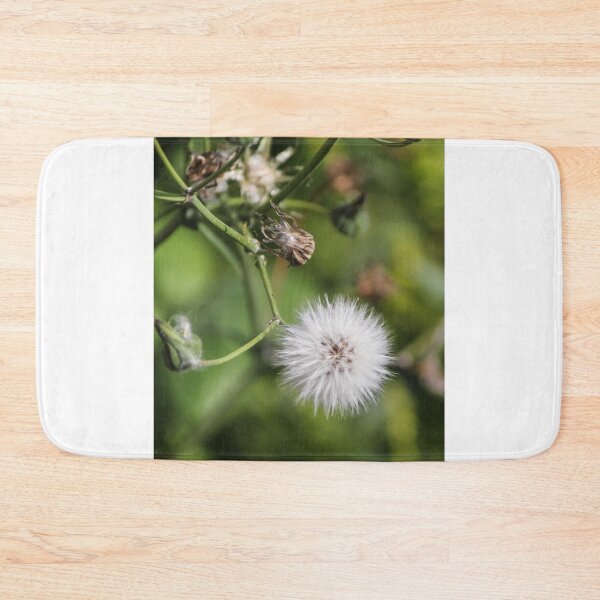 Item preview, Macro Dandelion Seed Head Puff On Green Stem With Soft Bokeh Background designed and sold by Nmallia.
