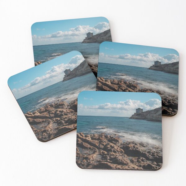 Item preview, Seaside Rocky Coastline With Historic Tower on Cliff Under Blue Sky and Clouds designed and sold by Nmallia.
