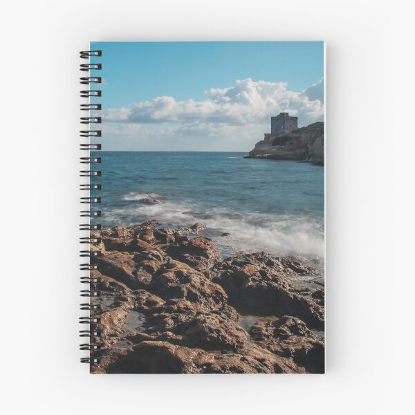 Item preview, Seaside Rocky Coastline With Historic Tower on Cliff Under Blue Sky and Clouds designed and sold by Nmallia.